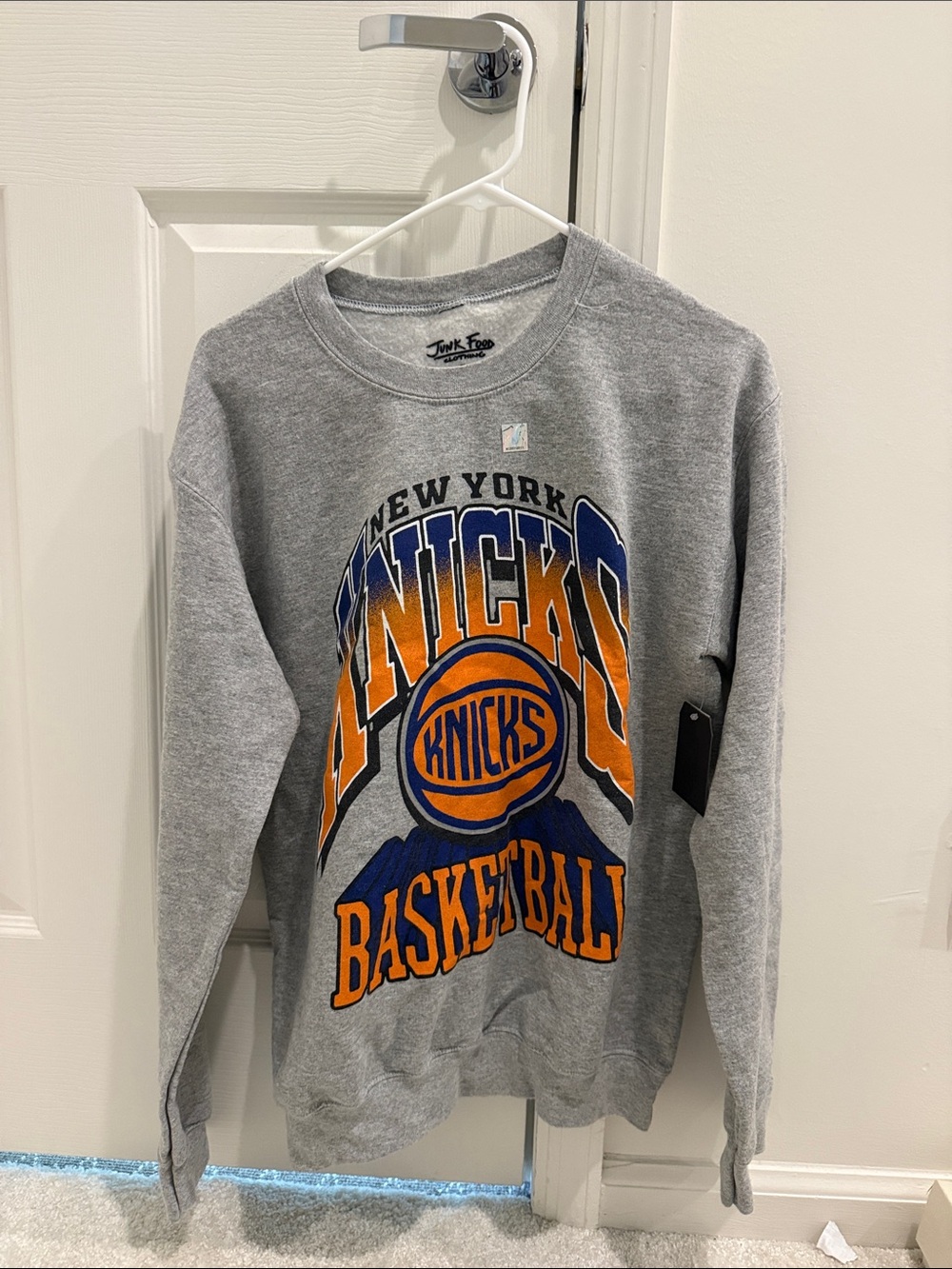 New York Knicks Grey Crewneck Sweatshirt with Orange & Blue Logo. Size medium